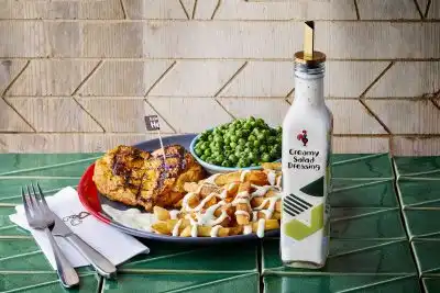 Nando's Chicken Butterfly, with Macho Peas and PERi-chips with Creamy Salad Dressing Drizzle