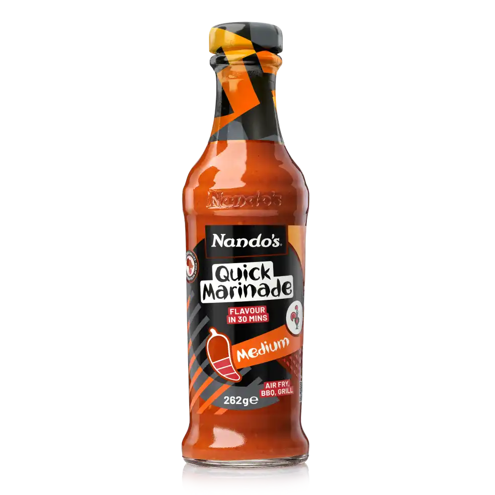 Nando's Quick Marinade, Medium, 262g bottle with vibrant label, promises flavor in 30 minutes. Perfect for air fry, BBQ, or grill.
